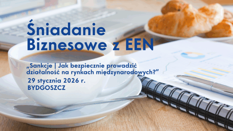 Baner informacyjny promujący Śniadanie Biznesowe z EEN pod tytułem „Sankcje | Jak bezpiecznie prowadzić działalność na rynkach międzynarodowych?”. Wydarzenie odbędzie się 29 stycznia 2026 r. w Bydgoszczy. Na grafice w tle znajduje się filiżanka kawy, laptop, dokumenty z wykresami oraz talerz z croissantami na drewnianym stole.